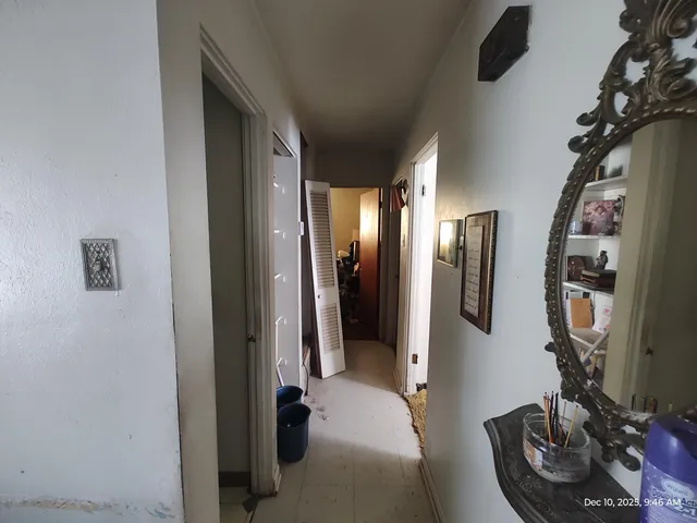 a view of a livingroom with furniture and windows