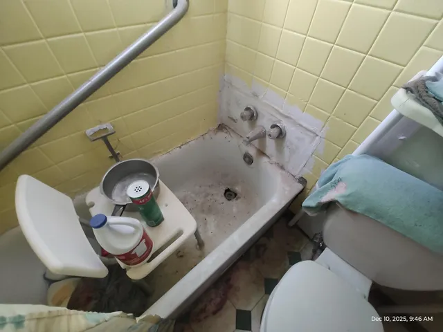 a bathroom with a sink and mirror