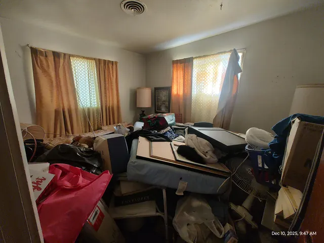 a room with furniture and window