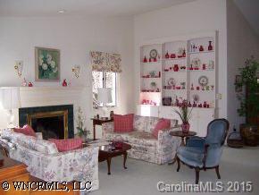 40 Hunting Country Trail Tryon, NC 28782 - Photo 6 of 9 a living room with furniture and a fireplace