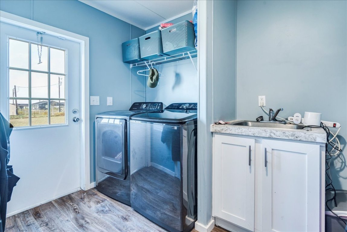 114 Gran Cielo Elgin, TX 78621 - Photo 22 of 40 a bathroom with a granite countertop sink a toilet and a shower