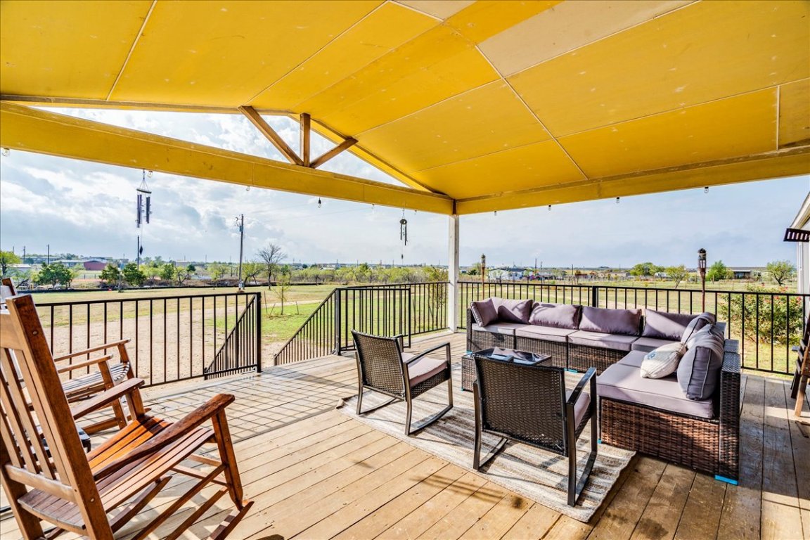 114 Gran Cielo Elgin, TX 78621 - Photo 24 of 40 a view of deck with outdoor seating