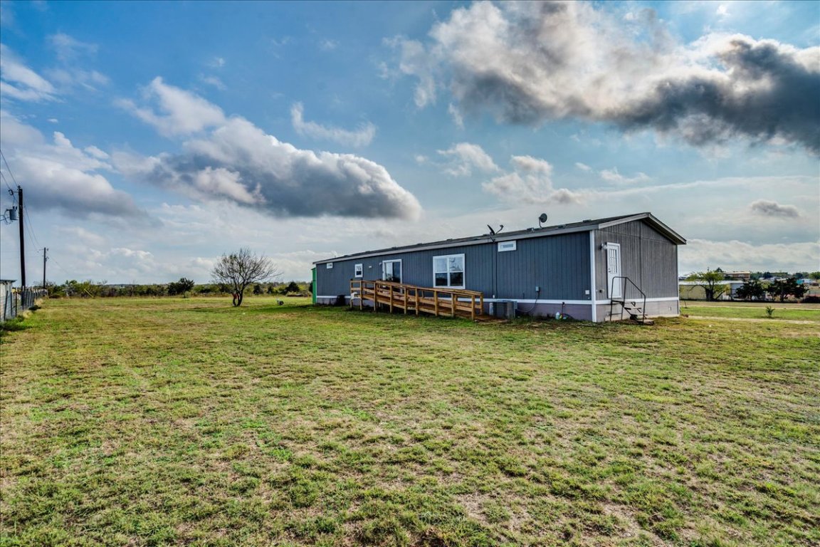114 Gran Cielo Elgin, TX 78621 - Photo 25 of 40 a bathroom with a sink and a yard