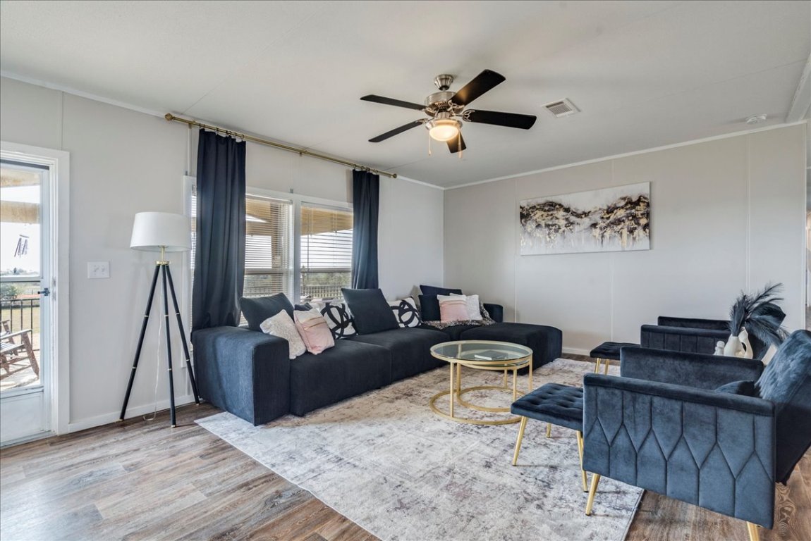 114 Gran Cielo Elgin, TX 78621 - Photo 4 of 40 a living room with furniture and a large window