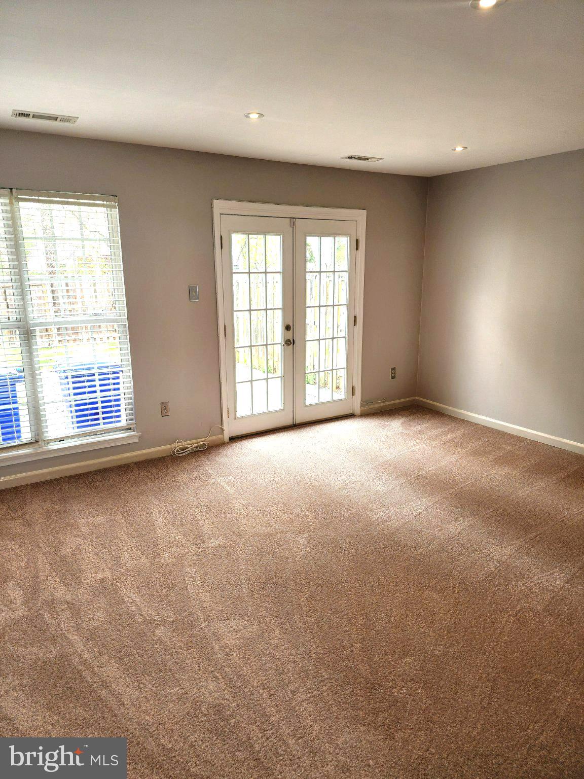2384 Mitchellville Road Bowie, MD 20716 - Photo 19 of 44 Bright and airy room with French doors.