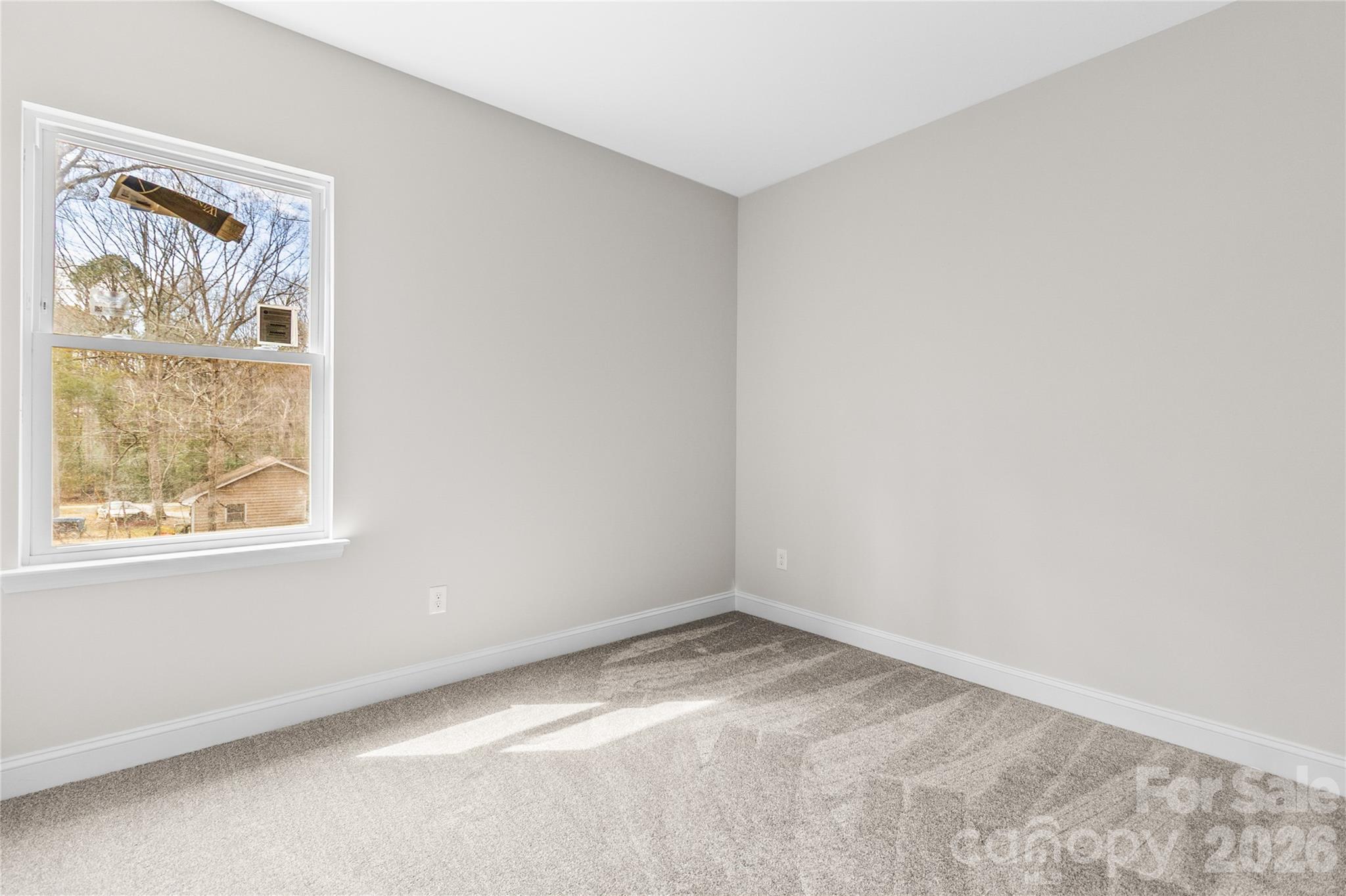 3692 Shannon Loop Denver, NC 28037 - Photo 32 of 47 an empty room with a window