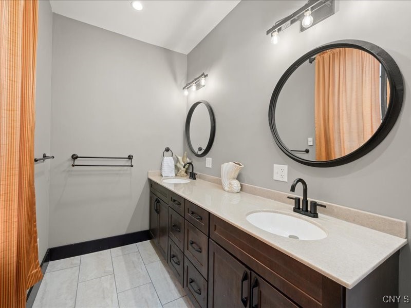 6 Ironwood Road New Hartford, NY 13413 - Photo 17 of 43 Here is the 1st floor full bath with double sinks