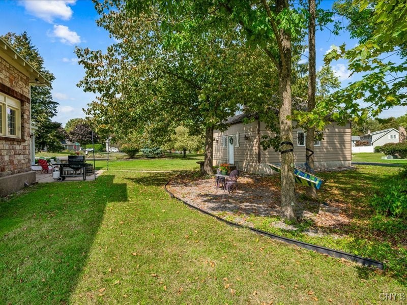 6 Ironwood Road New Hartford, NY 13413 - Photo 36 of 43 Patio to the left; gravel area near garage to the