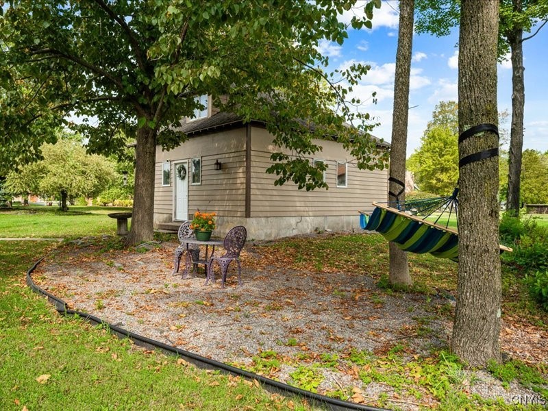 6 Ironwood Road New Hartford, NY 13413 - Photo 8 of 43 Gravel Area near garage and across from the patio