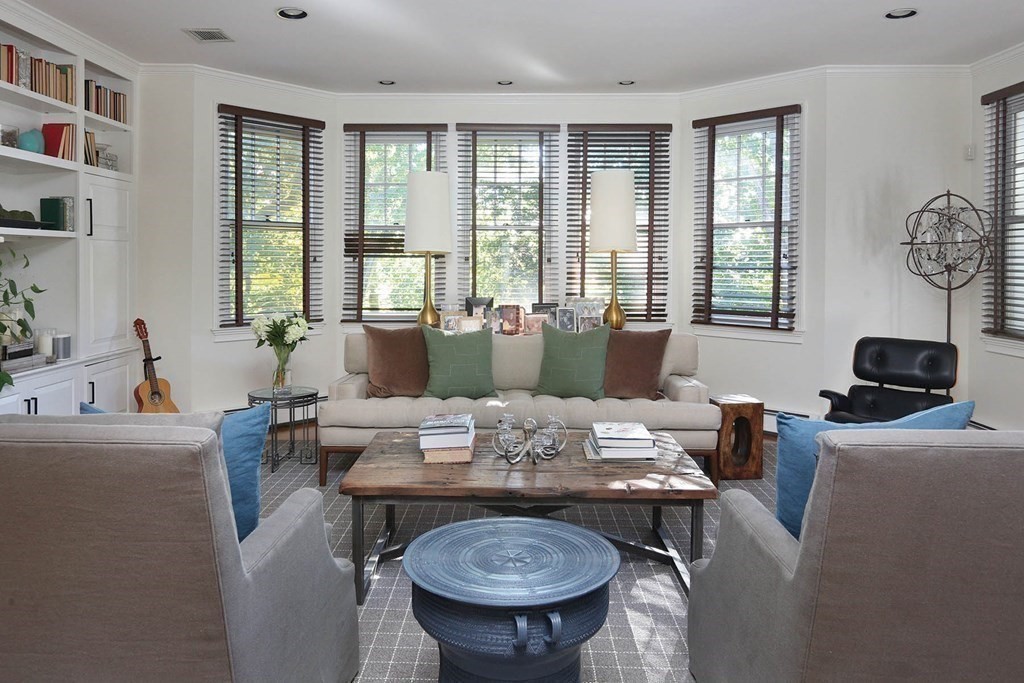 16 Pilgrim Road Newton, MA 02468 - Photo 9 of 25 a view of a dining room with furniture and windows