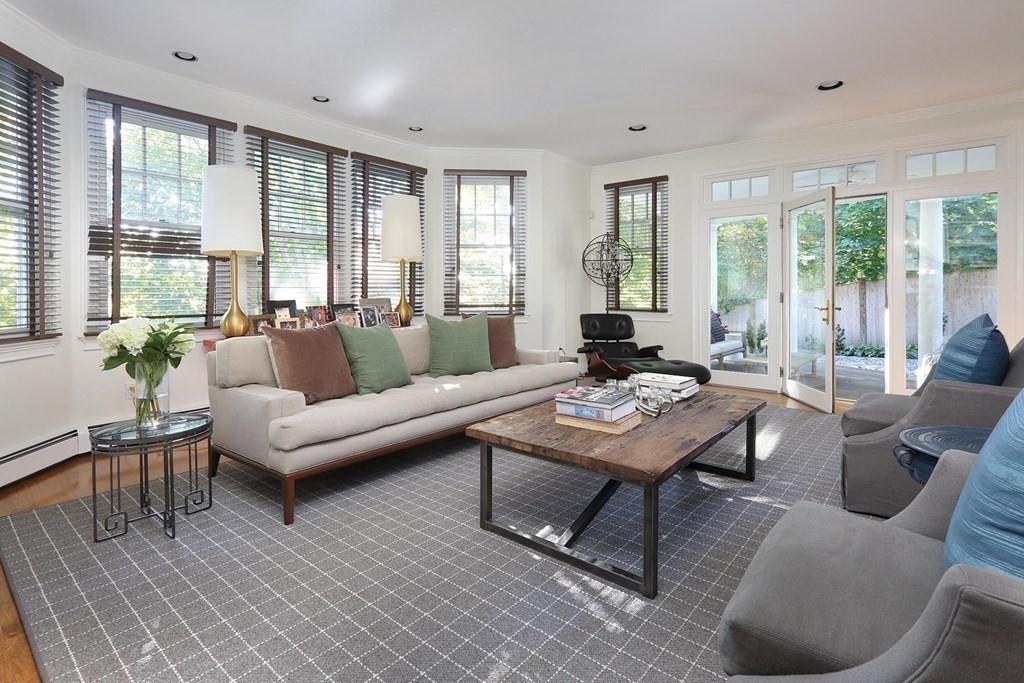 16 Pilgrim Road Newton, MA 02468 - Photo 10 of 25 a living room with furniture and a large window