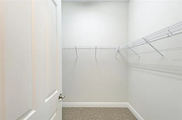 a view of small space with racks on the wall