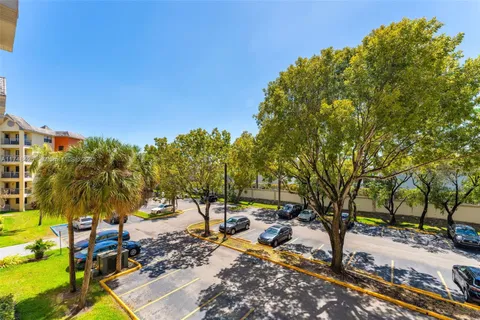 a view of swimming pool with a patio