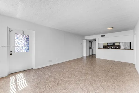 a view of a kitchen with a sink
