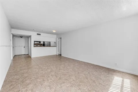 a view of a kitchen with a sink