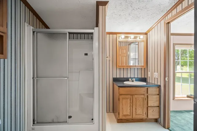 a view of an outdoor space and tennis court