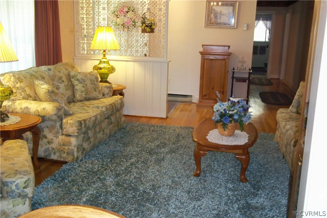 19613 Genito Road Moseley, VA 23120 - Photo 11 of 22 a living room with furniture and a painting