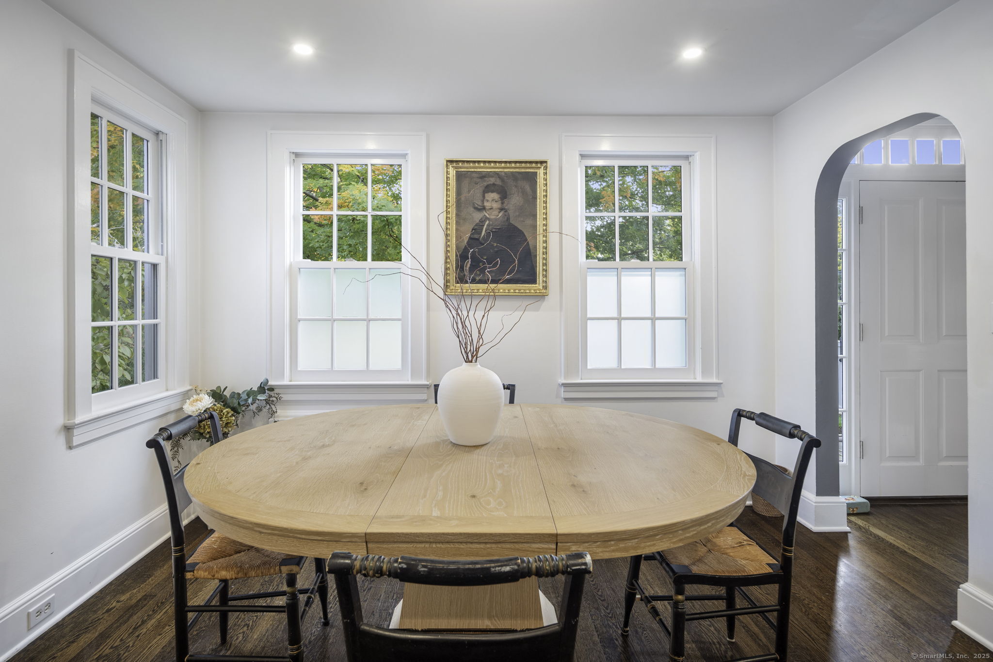 1 Flicker Lane Norwalk, CT 06853 - Photo 11 of 39 a view of a dining room with furniture window and wooden floor