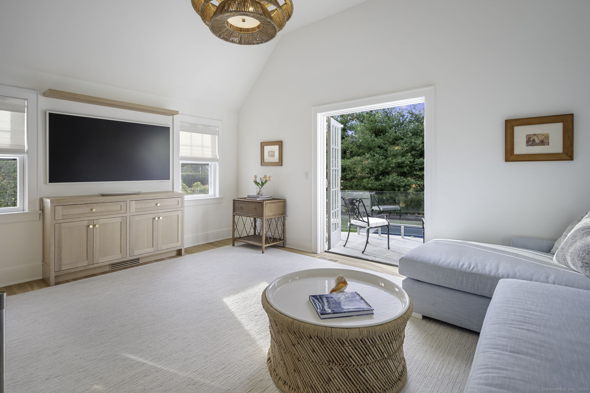 1 Flicker Lane Norwalk, CT 06853 - Photo 14 of 39 a living room with furniture and a flat screen tv