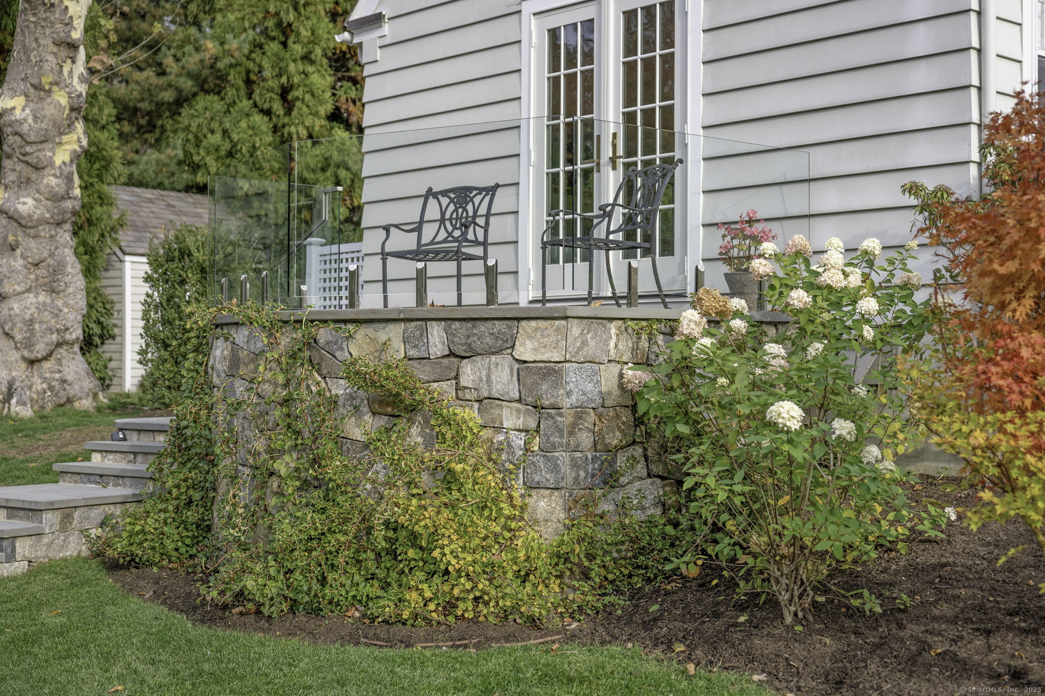 1 Flicker Lane Norwalk, CT 06853 - Photo 19 of 39 a view of a garden