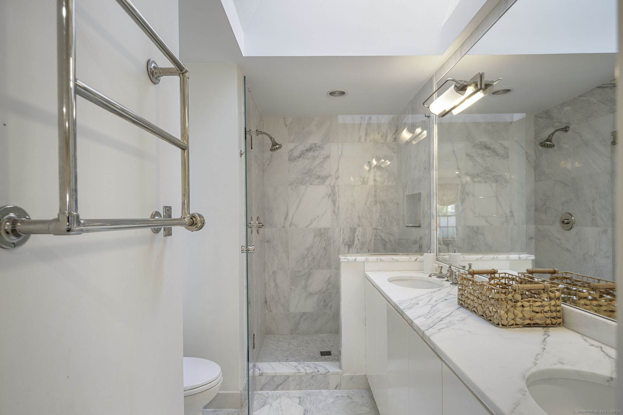 1 Flicker Lane Norwalk, CT 06853 - Photo 22 of 39 a bathroom with a granite countertop sink a toilet a mirror and shower