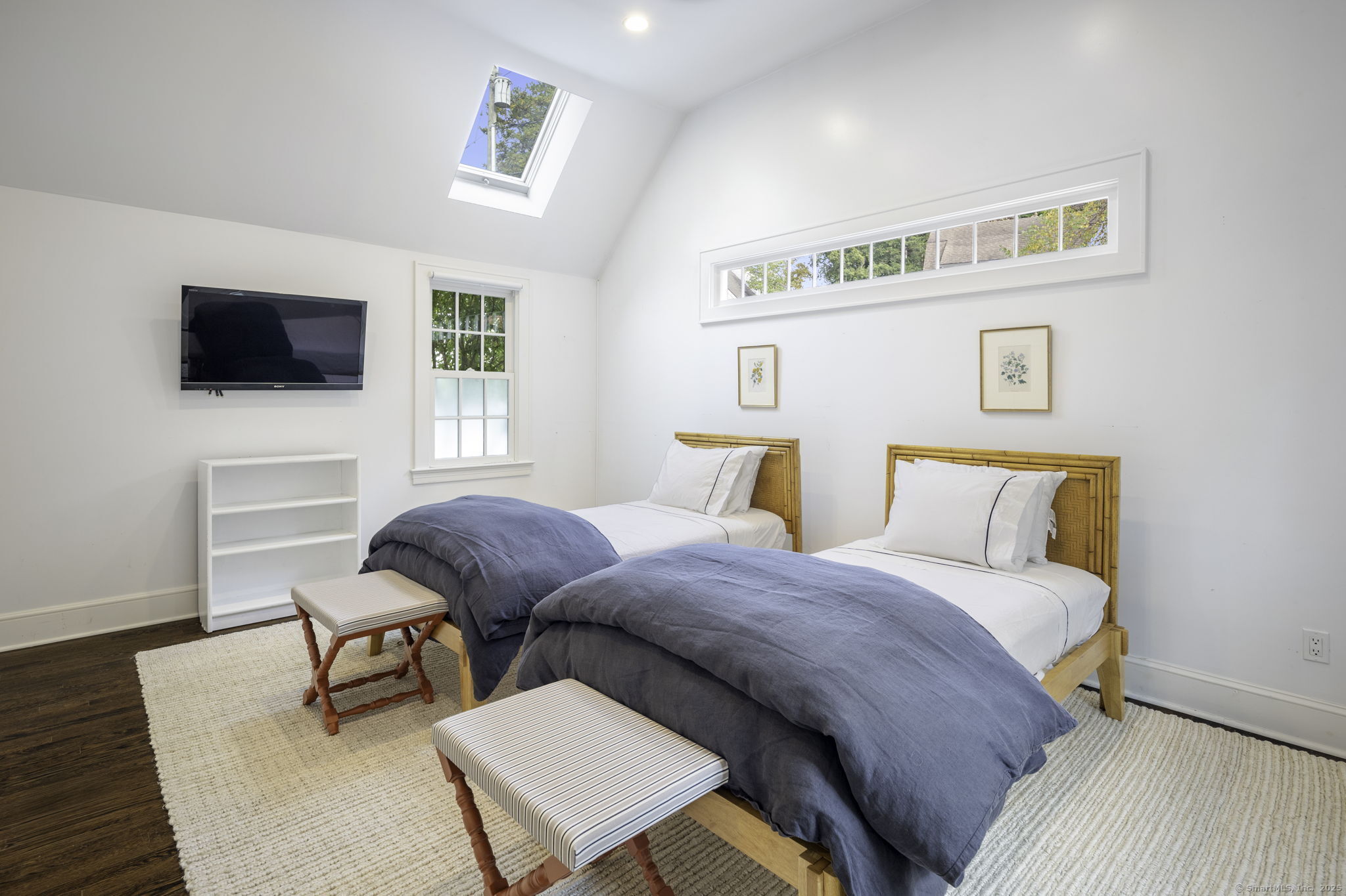 1 Flicker Lane Norwalk, CT 06853 - Photo 25 of 39 a bedroom with a bed and a flat screen tv