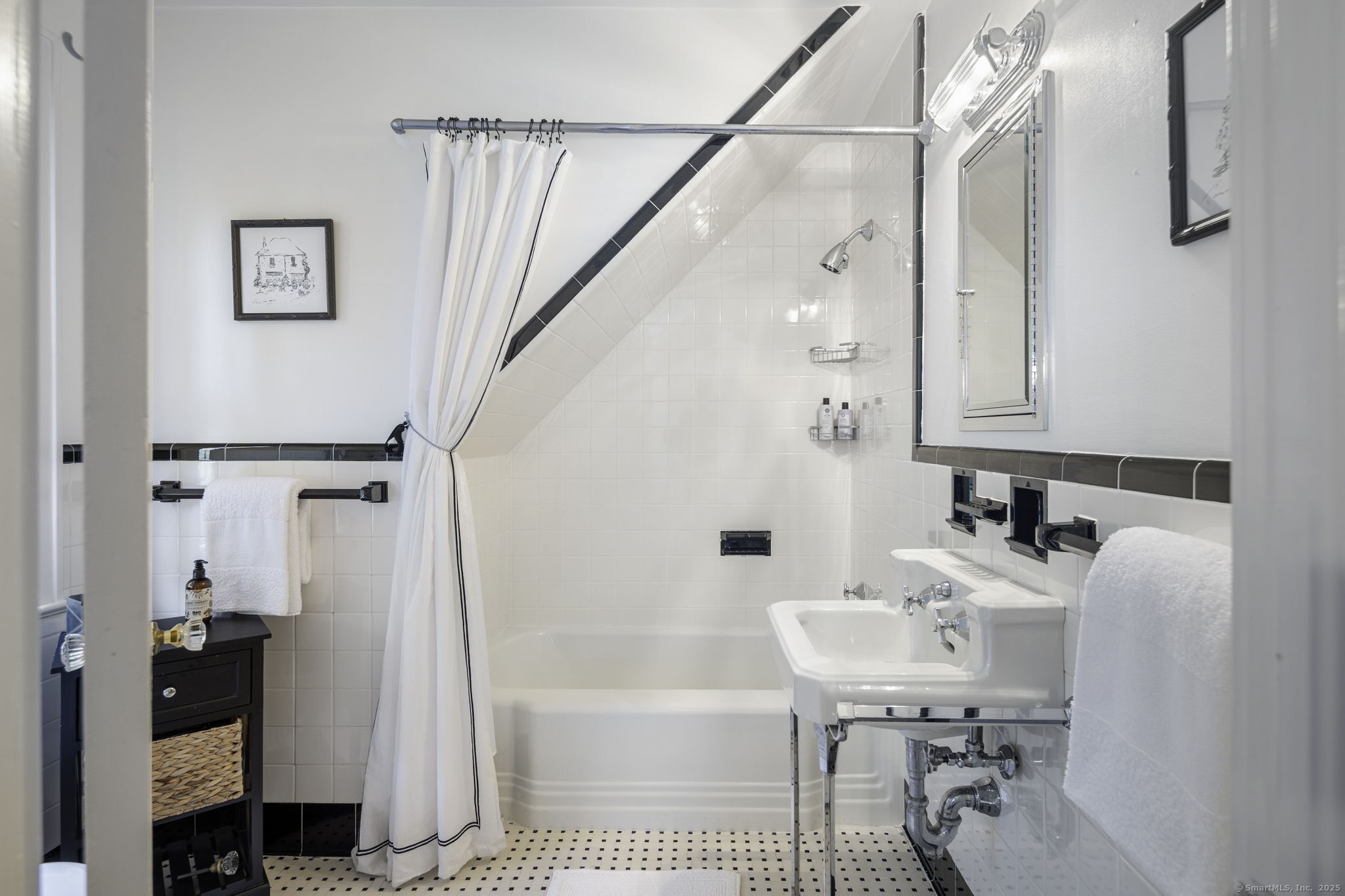 1 Flicker Lane Norwalk, CT 06853 - Photo 29 of 39 a bathroom with a sink a toilet and a bathtub