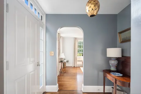 a view of entryway with wooden floor