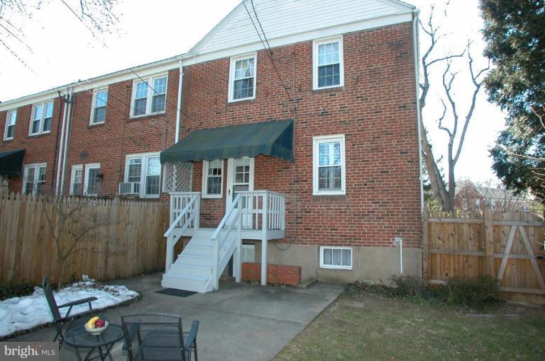 6461 Blenheim Road Baltimore, MD 21212 - Photo 17 of 20 a front view of a house with a garden
