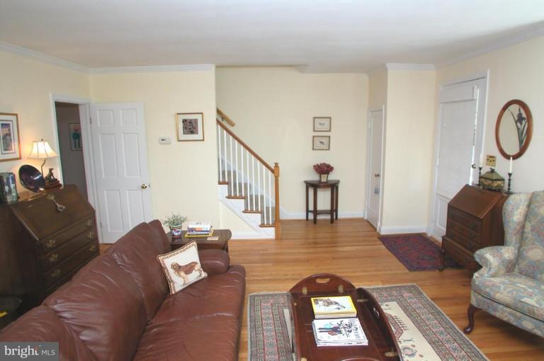 6461 Blenheim Road Baltimore, MD 21212 - Photo 4 of 20 a living room with furniture and a dining table