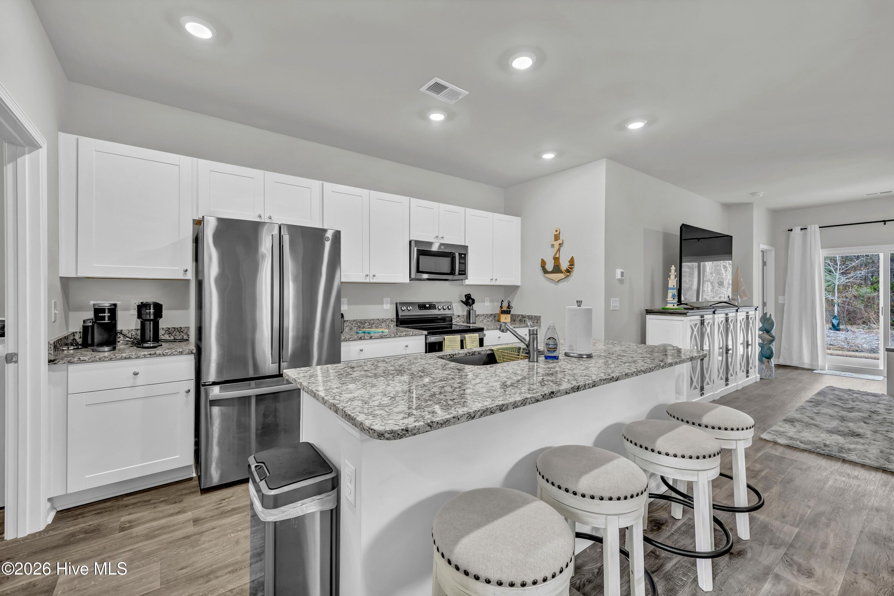 318 Ladyfish Loop Northwest Sunset Beach, NC 28468 - Photo 6 of 48 006_img_2678_646