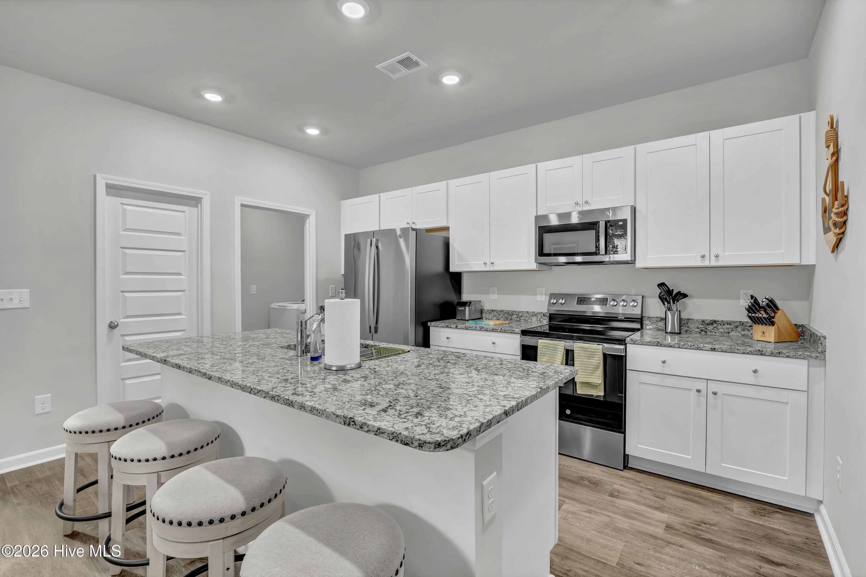 318 Ladyfish Loop Northwest Sunset Beach, NC 28468 - Photo 8 of 48 008_img_2684_900