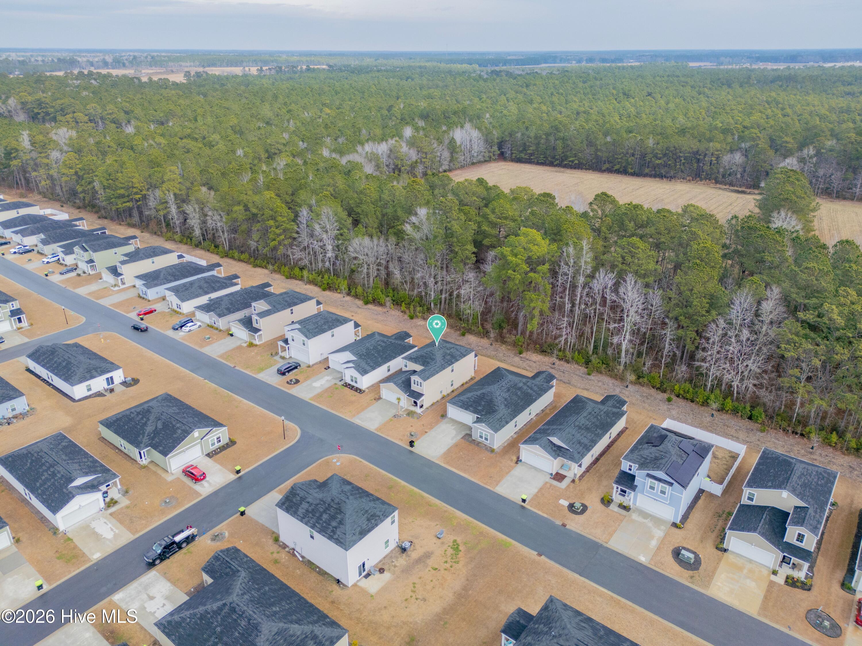 318 Ladyfish Loop Northwest Sunset Beach, NC 28468 - Photo 37 of 48 037_dji_0247_1_48