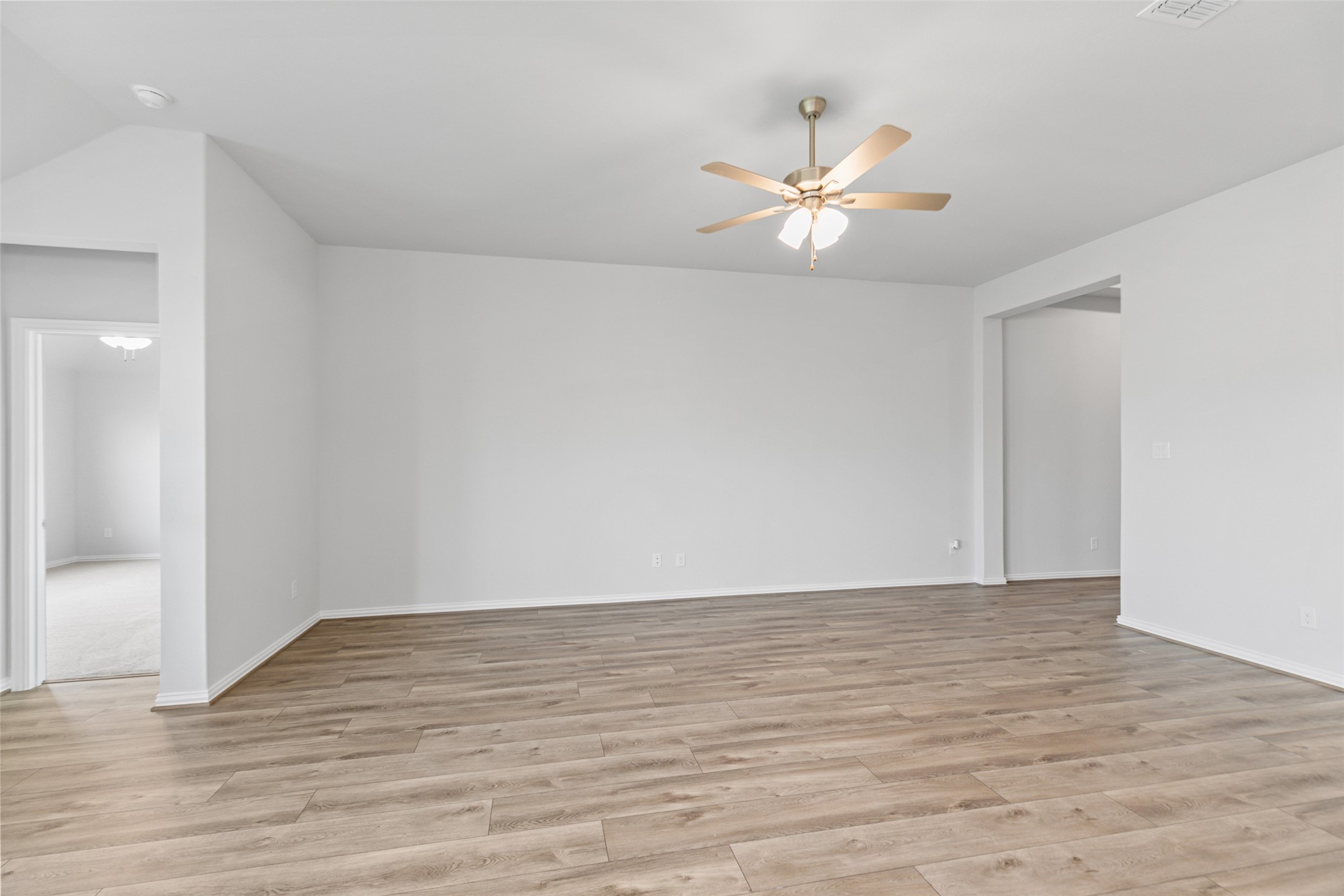 803 Evergreen Frst Lane Rosharon, TX 77583 - Photo 14 of 31 a view of an empty room with wooden floor