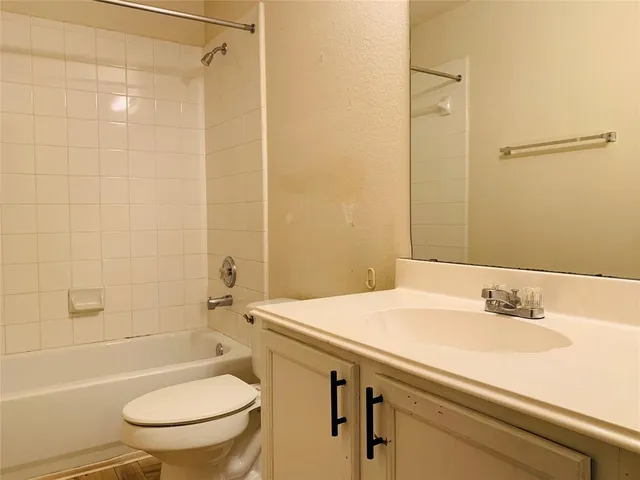 a kitchen with a stove and a microwave