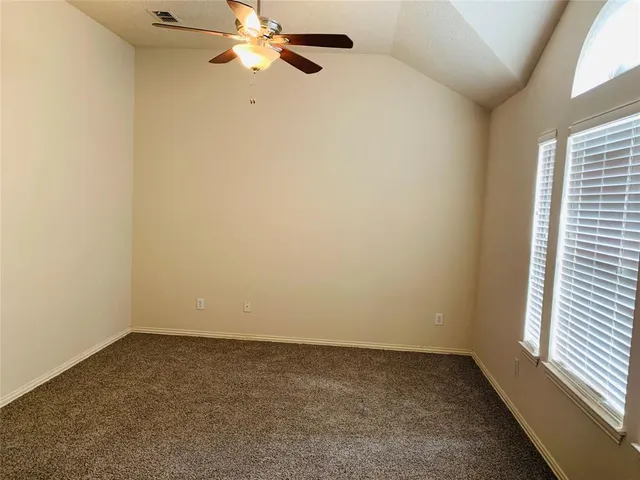 a kitchen with a sink cabinets and a fireplace