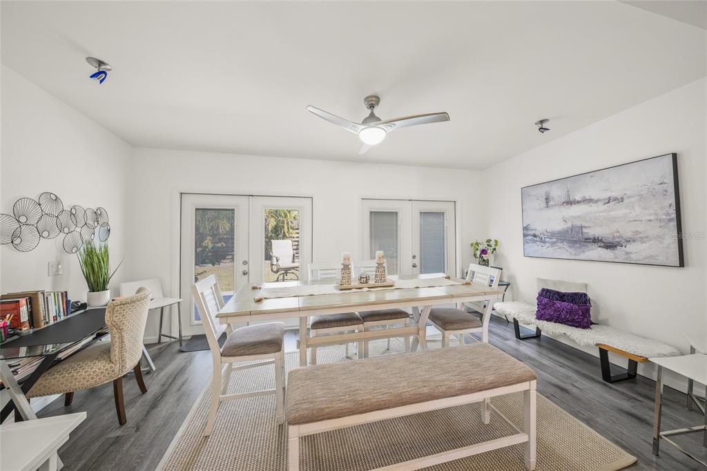 2427 Tulip Street Sarasota, FL 34239 - Photo 12 of 39 a view of a dining room with furniture window and outside view