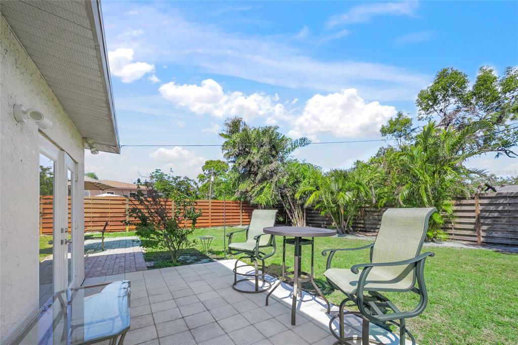 2427 Tulip Street Sarasota, FL 34239 - Photo 21 of 39 a view of a chairs and table in the patio