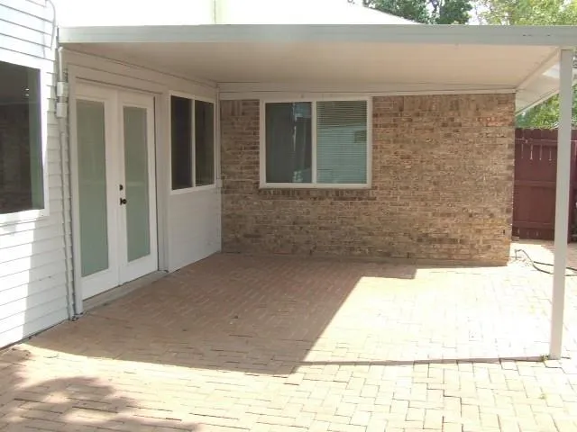 a view of entrance gate of a house
