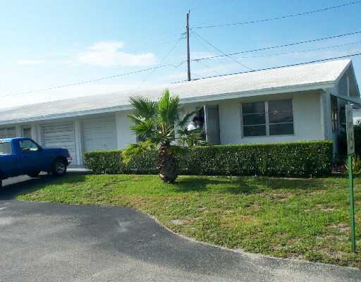 722 Ridge Road, Unit 1 Lantana, FL 33462 - Photo 1 of 1 a view of a house with a garden