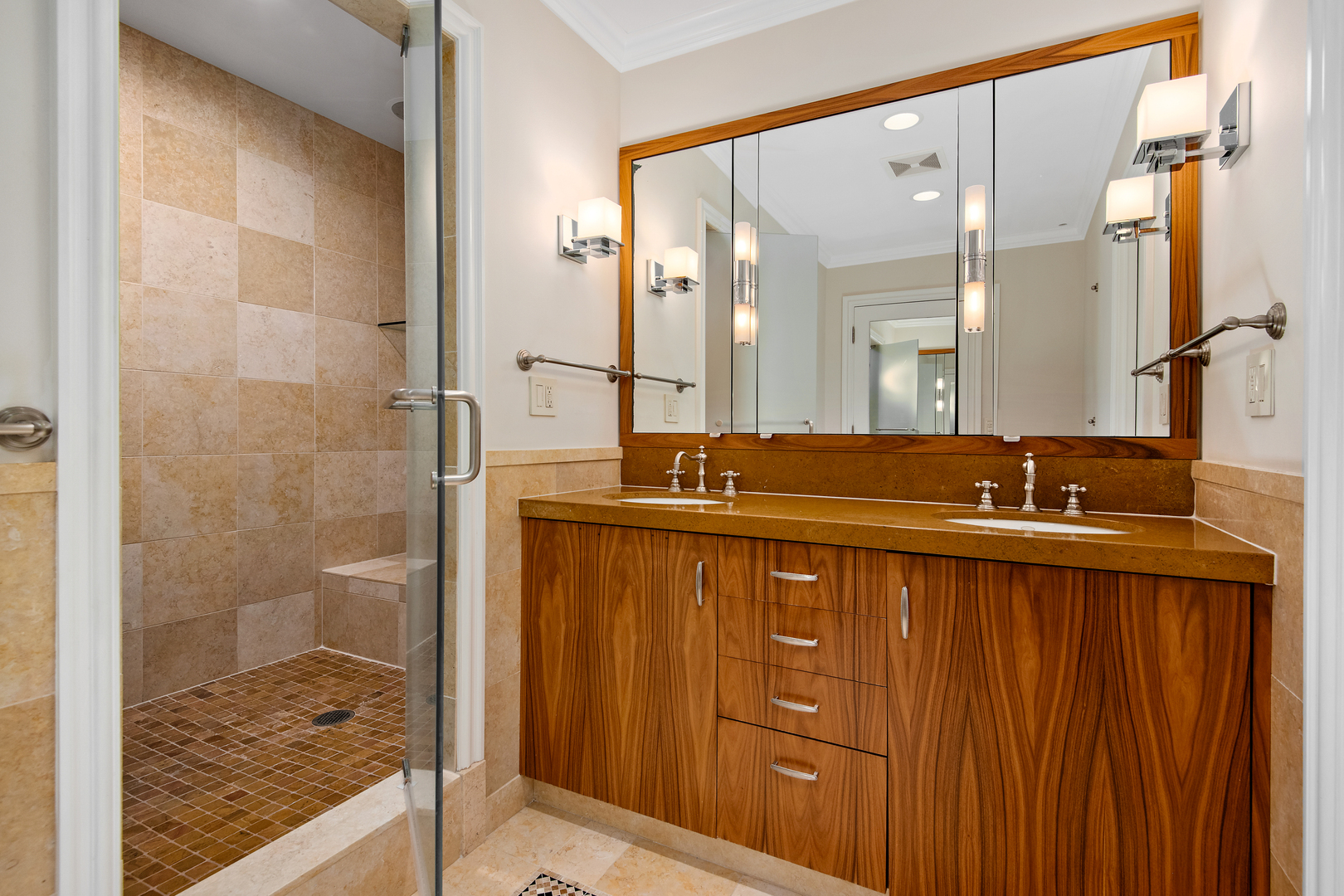 421 West Melrose Street, Unit 18BC Chicago, IL 60657 - Photo 16 of 29 a bathroom with a sink and a mirror
