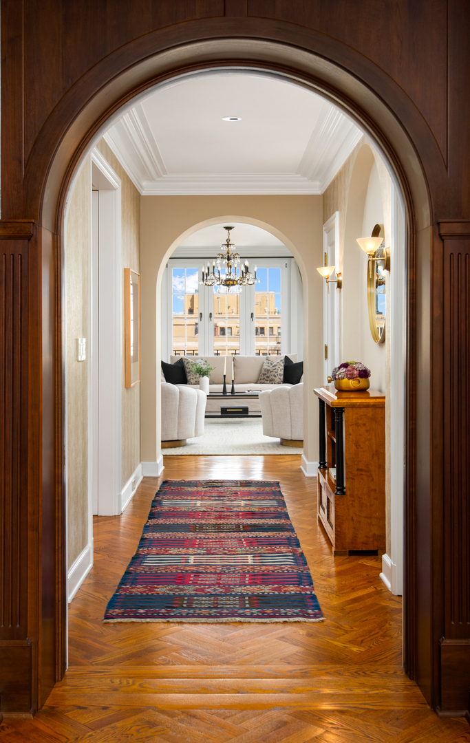 421 West Melrose Street, Unit 18BC Chicago, IL 60657 - Photo 6 of 29 a lobby with furniture and a rug