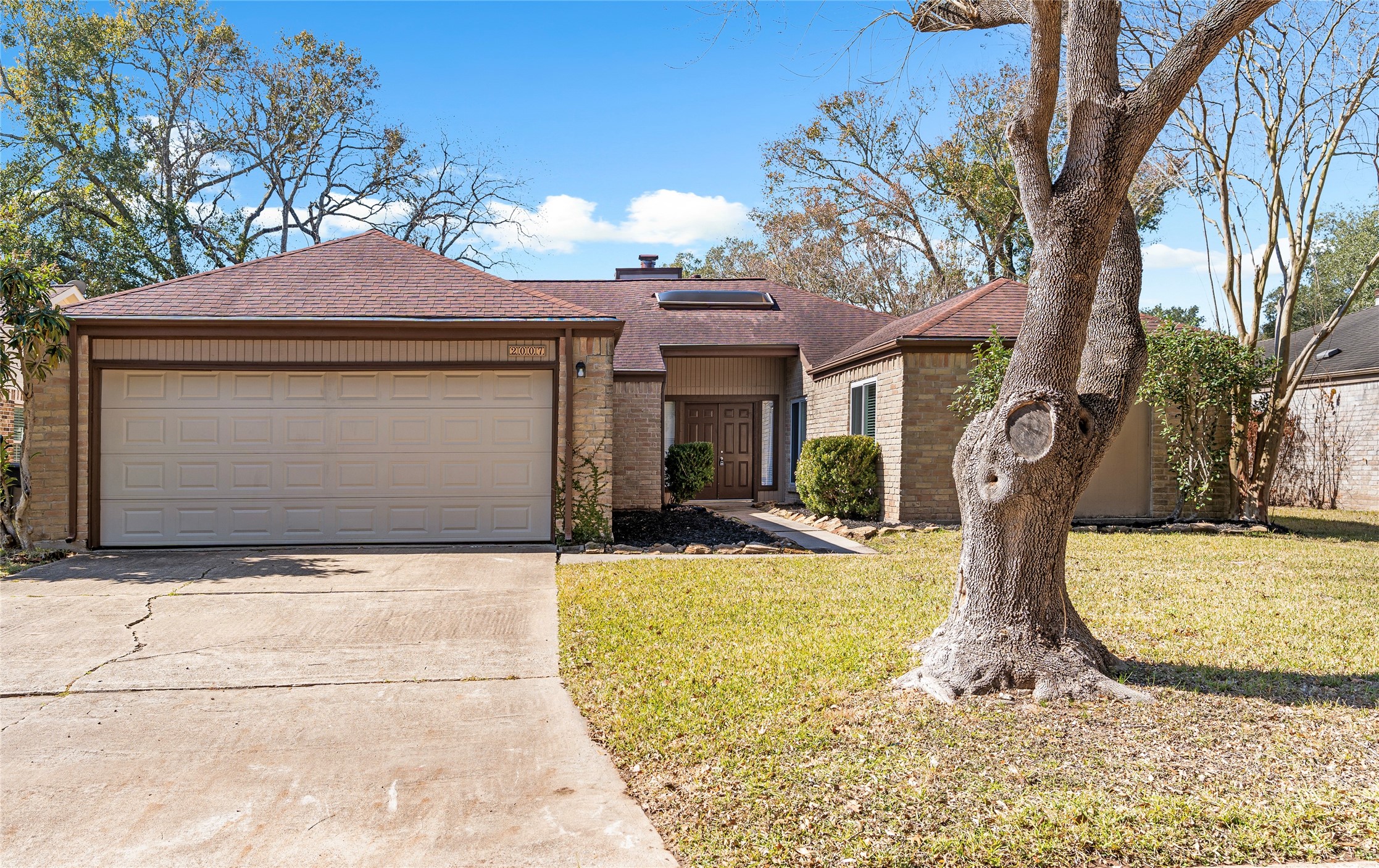 2007 Fernspray Lane Houston, TX 77084 - Photo 2 of 34 a view of a house with basketball court