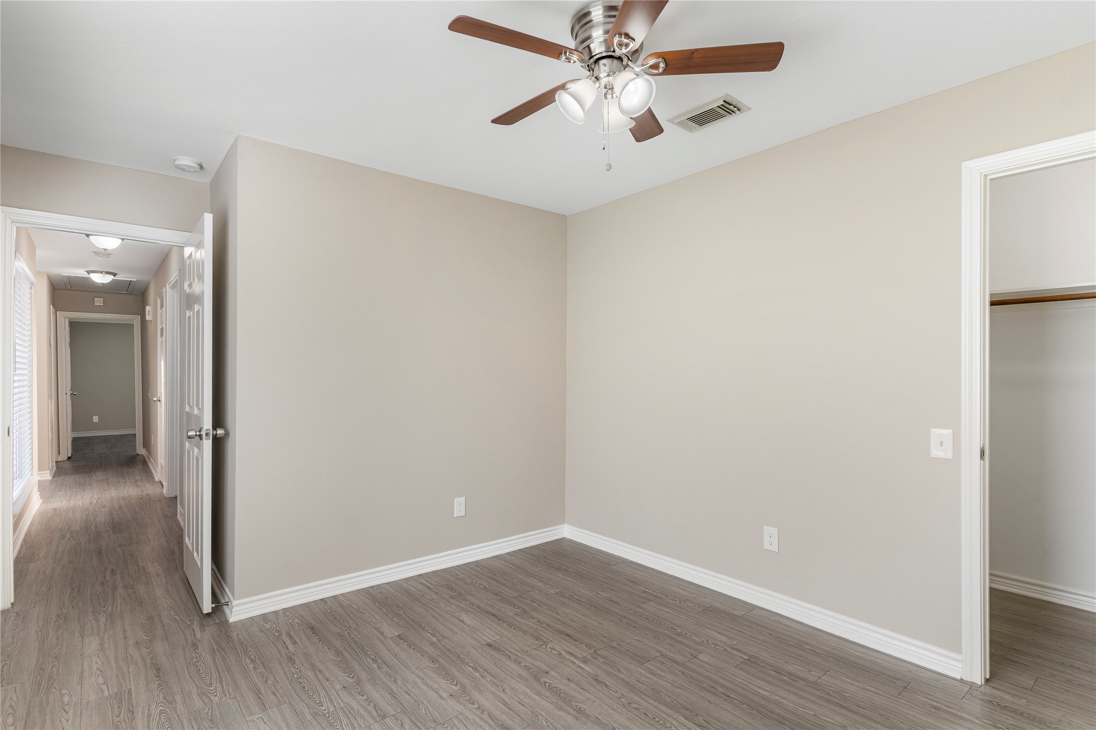 2007 Fernspray Lane Houston, TX 77084 - Photo 26 of 34 a view of an empty room with wooden floor