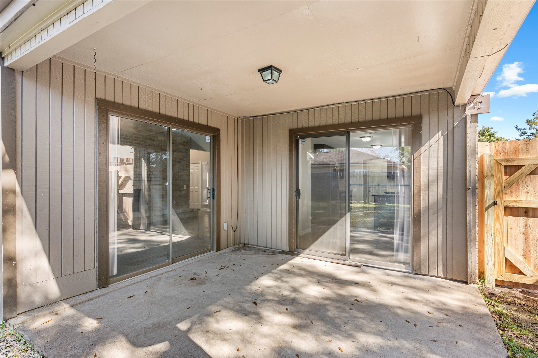 2007 Fernspray Lane Houston, TX 77084 - Photo 28 of 34 a view of a hallway with wooden floor and door