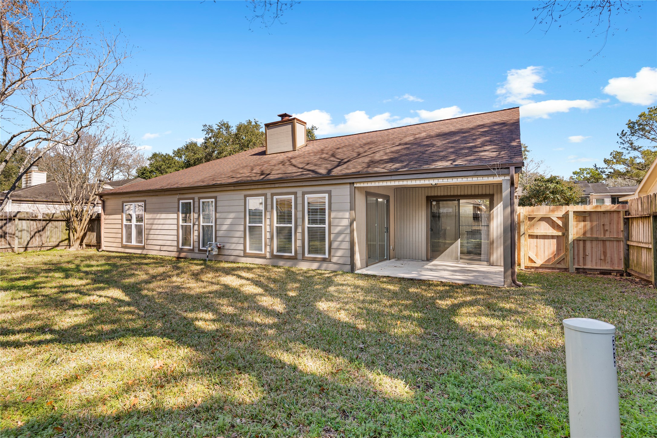 2007 Fernspray Lane Houston, TX 77084 - Photo 30 of 34 a view of a yard in front of a house with a large tree