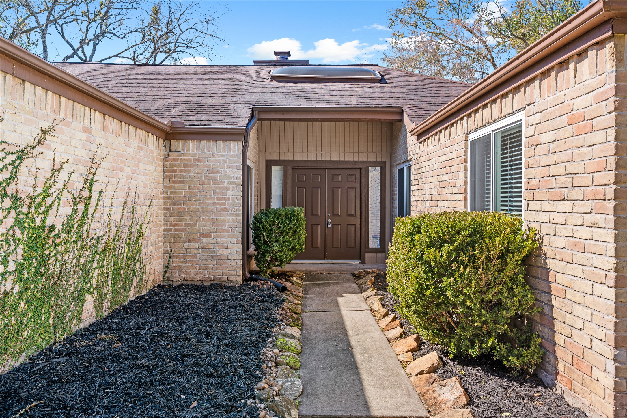 2007 Fernspray Lane Houston, TX 77084 - Photo 3 of 34 a view of a house with a garden