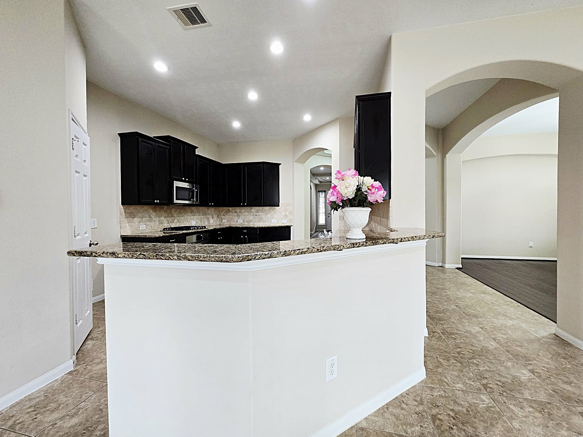 14015 Hailey Springs Lane Humble, TX 77396 - Photo 19 of 34 a view of living room with furniture and a flat screen tv