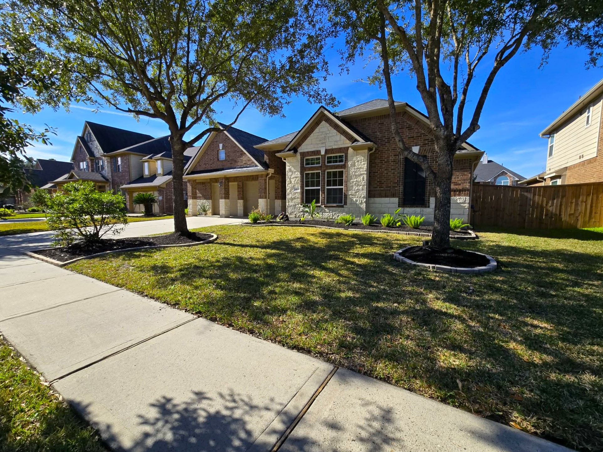 14015 Hailey Springs Lane Humble, TX 77396 - Photo 34 of 34 a front view of a house with a yard