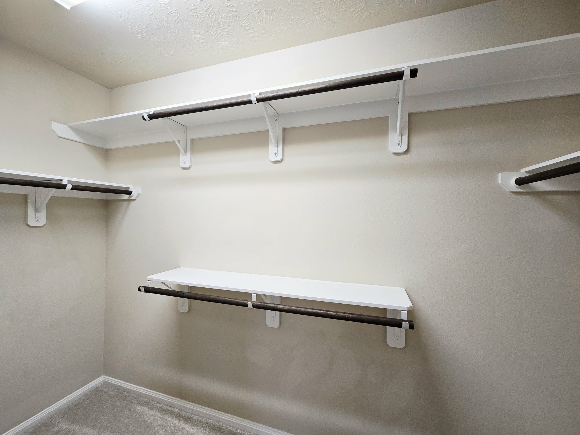 14015 Hailey Springs Lane Humble, TX 77396 - Photo 6 of 34 a view of a room with racks on the wall